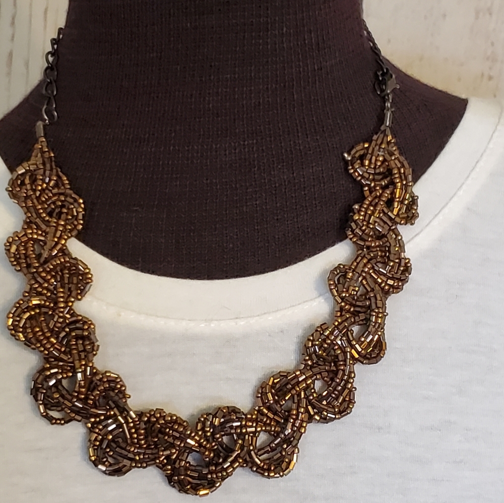 Glittery brown bead braided necklace with black chain